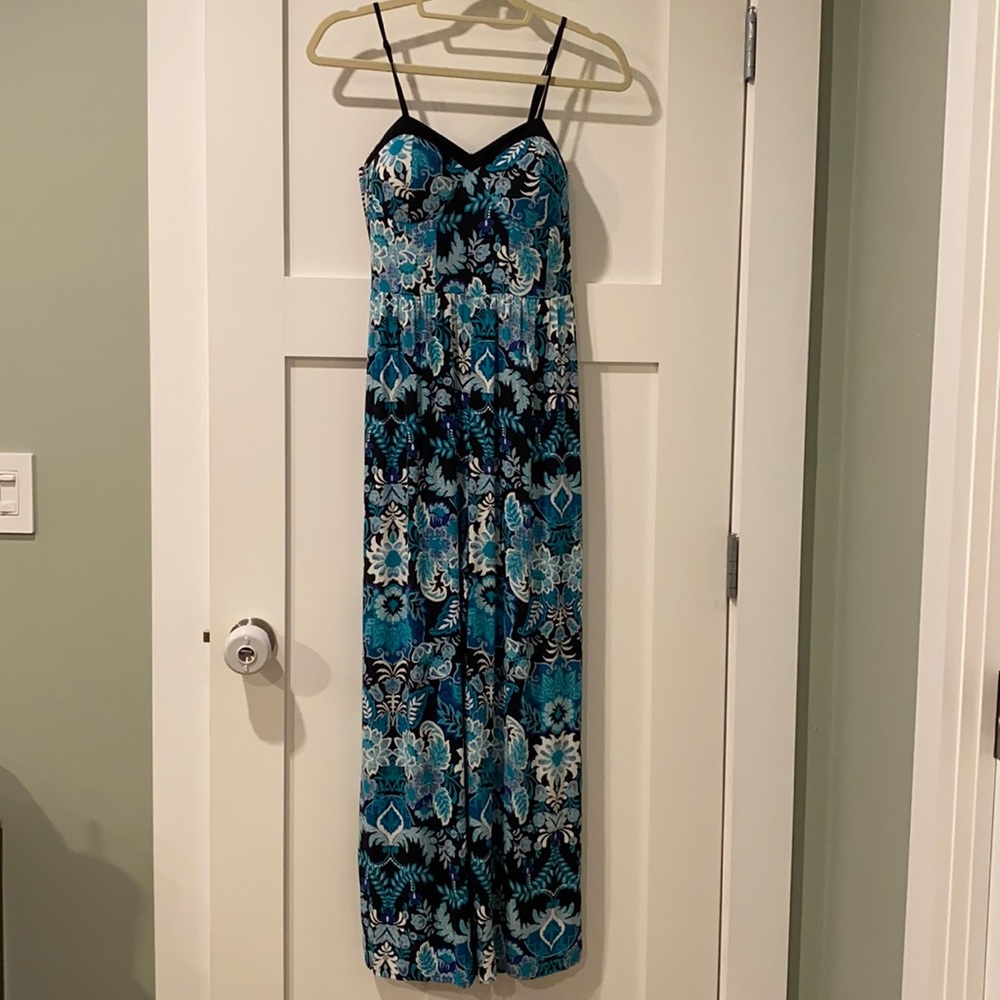 Teal and blue paisley patterned jumpsuit with spaghetti straps.